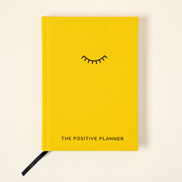 Yellow planner for positive intentions and productivity