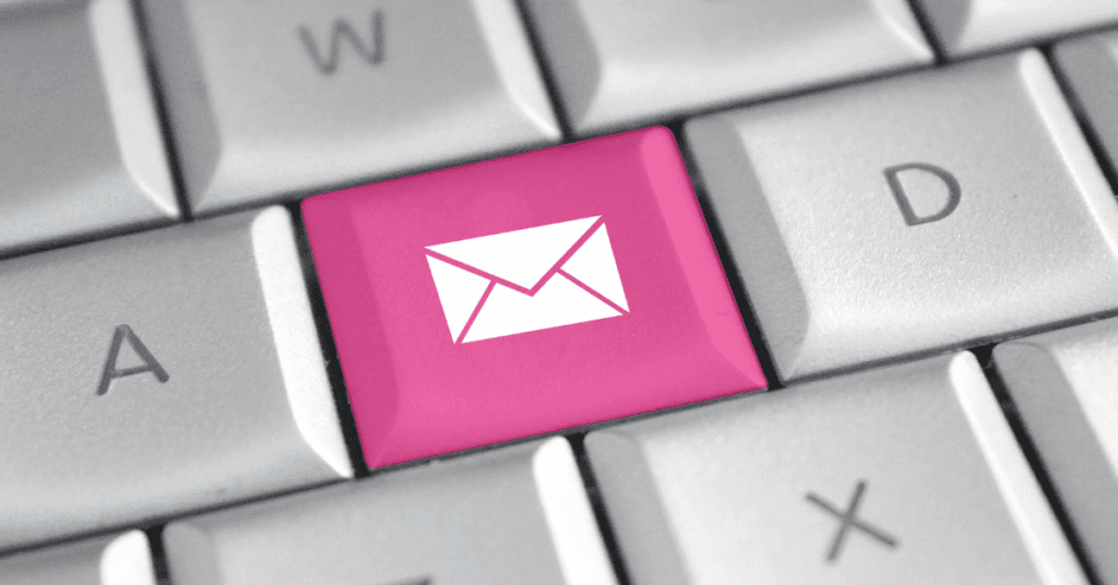 Bright pink keyboard button with a mail symbol