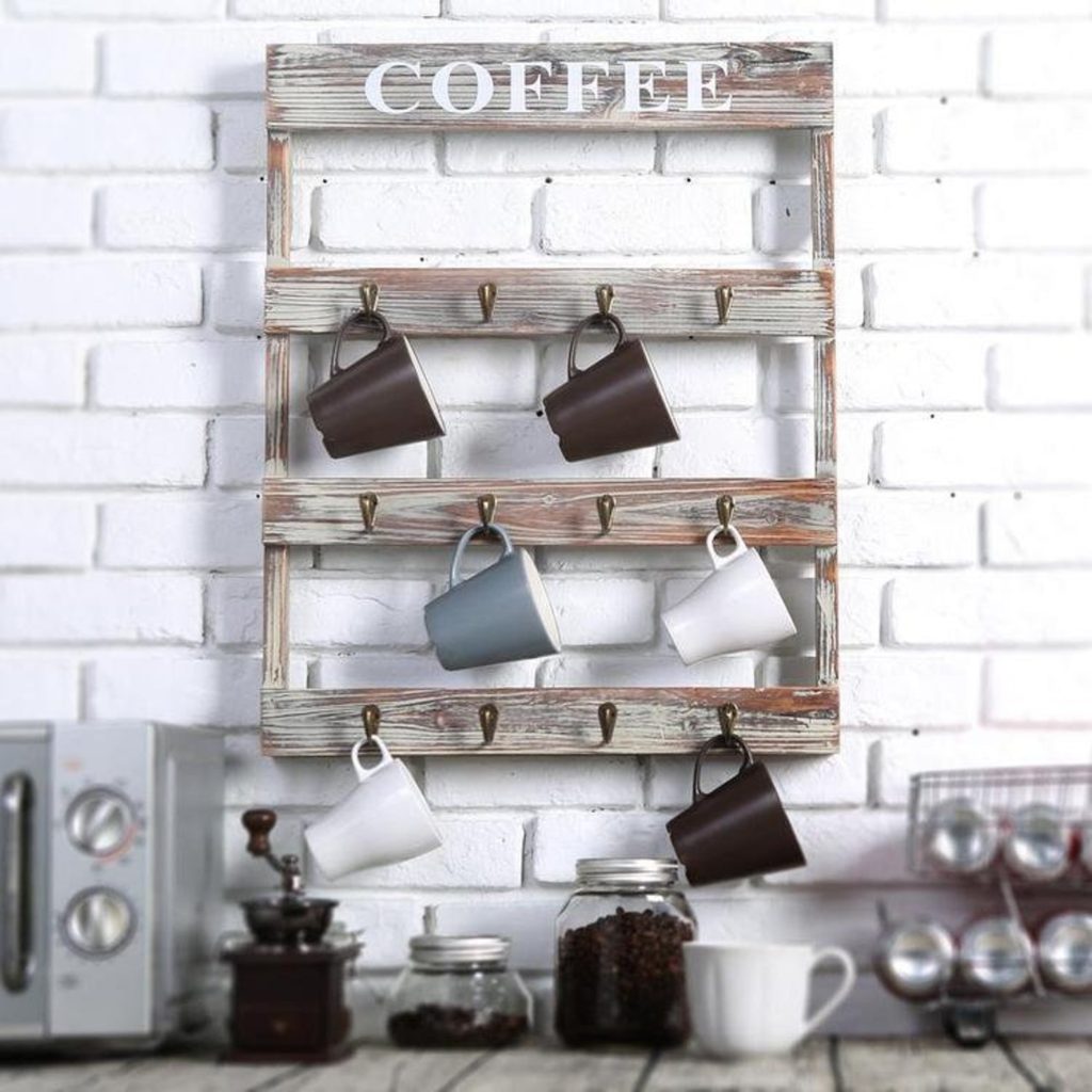 Wooden coffee mug holder mounted on a wall