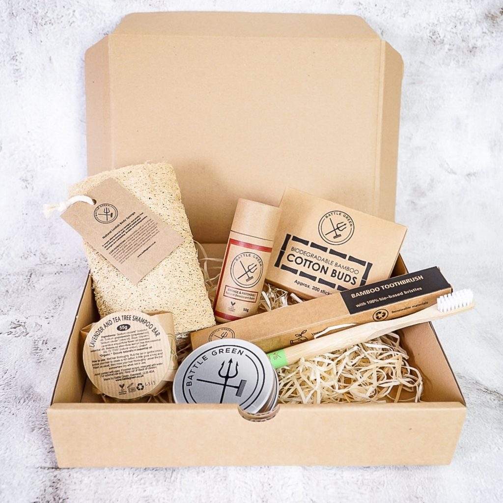 Cardboard box full of eco friendly self care items